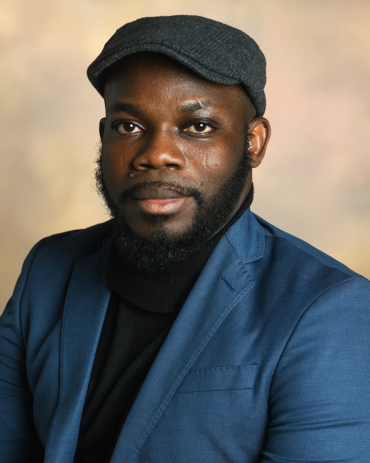 Headshot of D.M. Aderibigbe